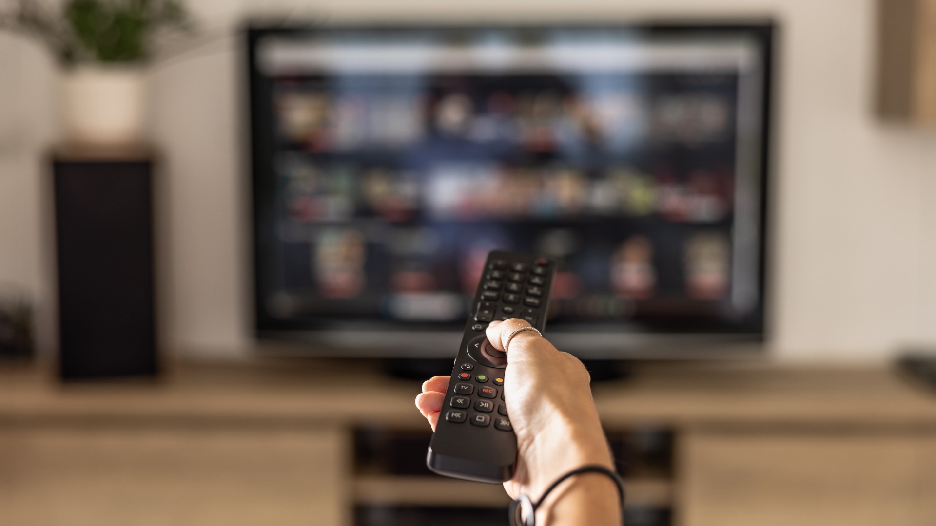 Remote control pointed at TV 
