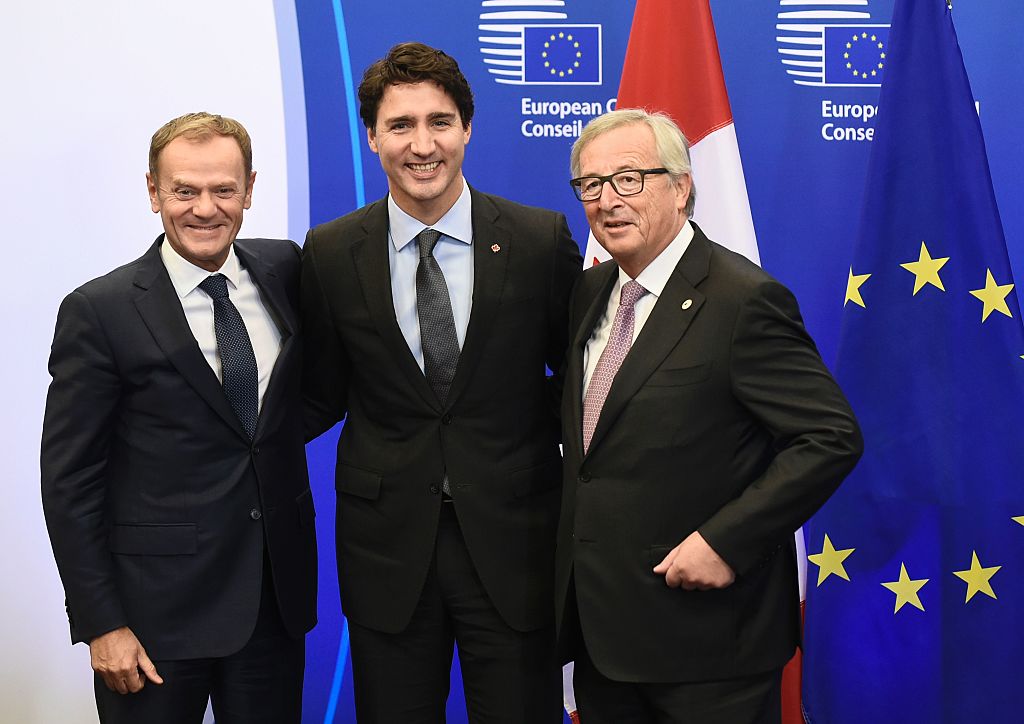 European Council President Donald Tusk, Canadian Prime Minister Justin Trudeau and European Commission President Jean-Claude Juncker
