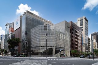 Sony Park Ginza and its brutalist volume, with meshed exterior and concrete interior