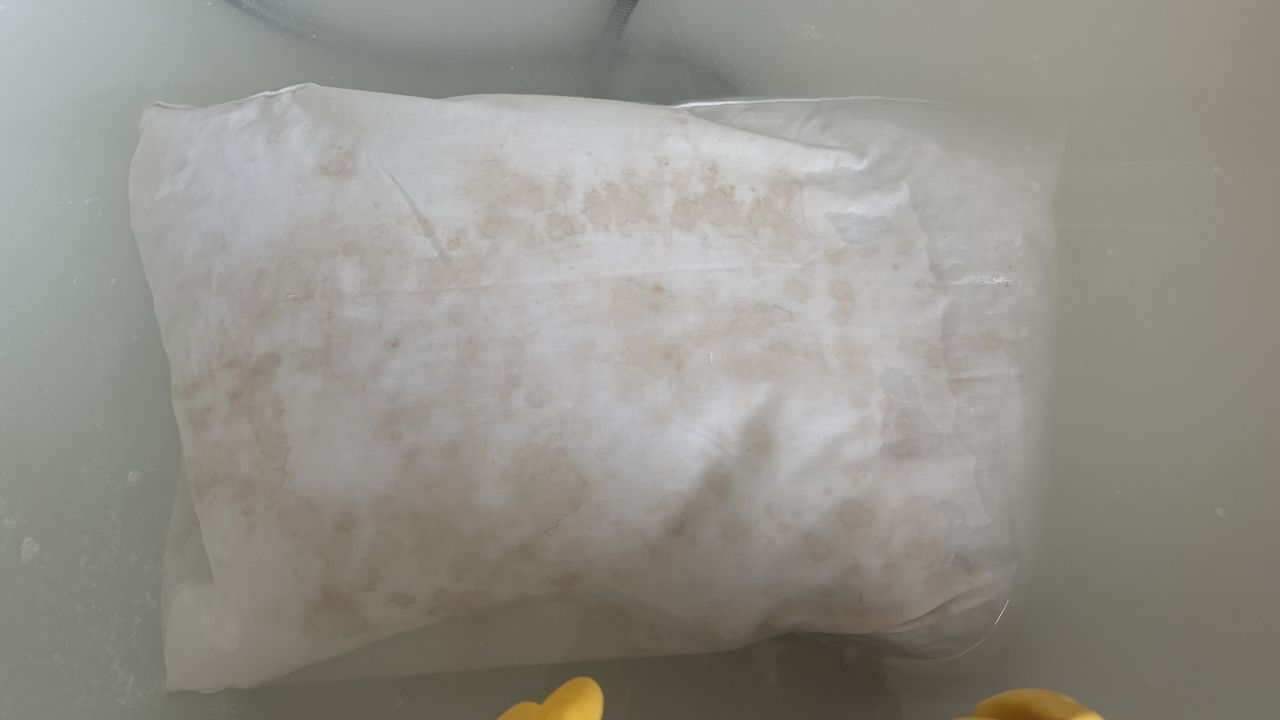 Stained pillow pre-soda crystal soak.