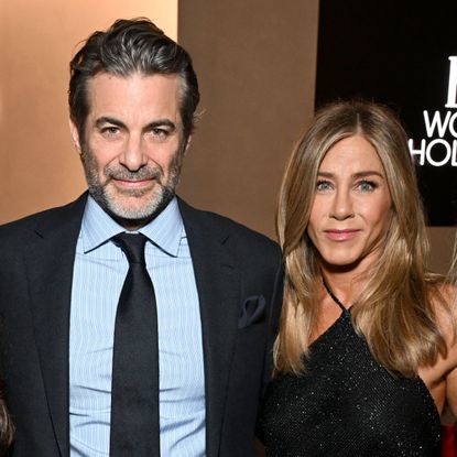 Jennifer Aniston and Jim Curtis attend ELLE's 2025 Women in Hollywood Celebration