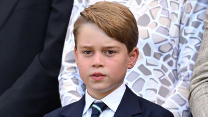 Prince George attends the Men's Singles Final at Wimbledon