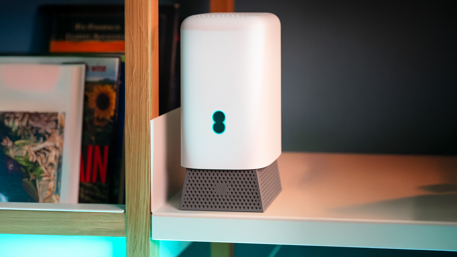 The EE router on a bookcase
