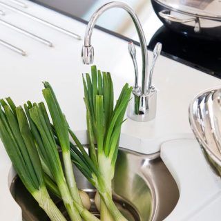 sink with tap and chopping board