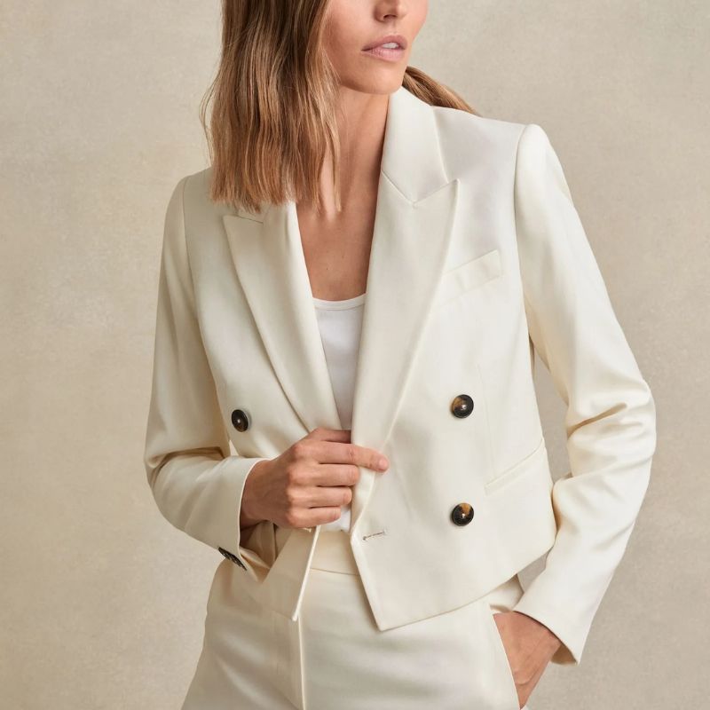 Reiss Double-Breasted Cropped Blazer in Cream on model 