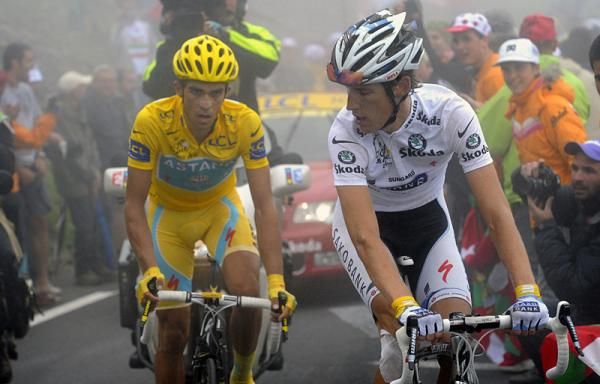 Andy Schleck checks to see how Alberto Contador is faring on the Tourmalet.