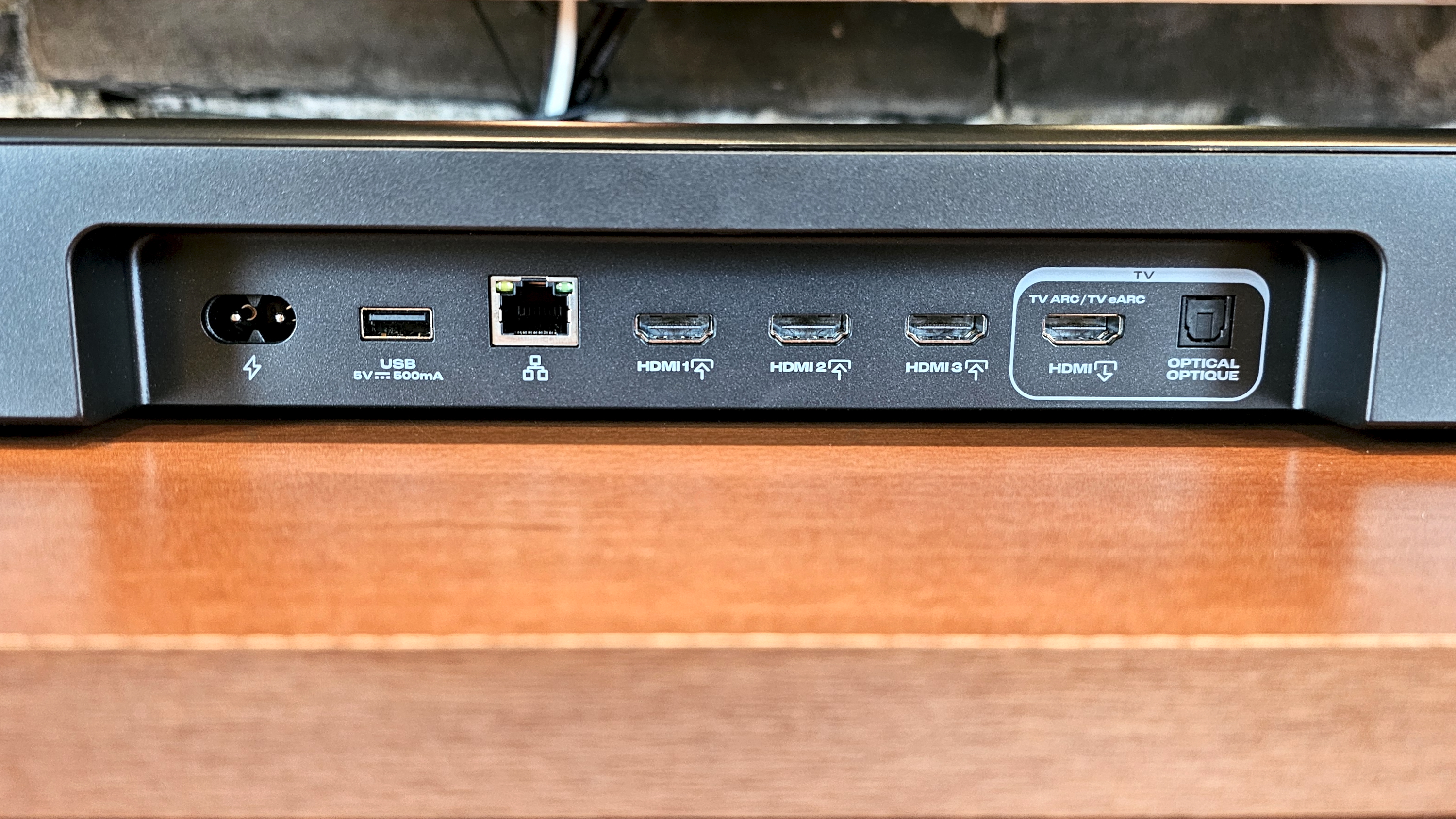 JBL Bar 1000MK2 gallery showing ports and surround speaker docking and power options