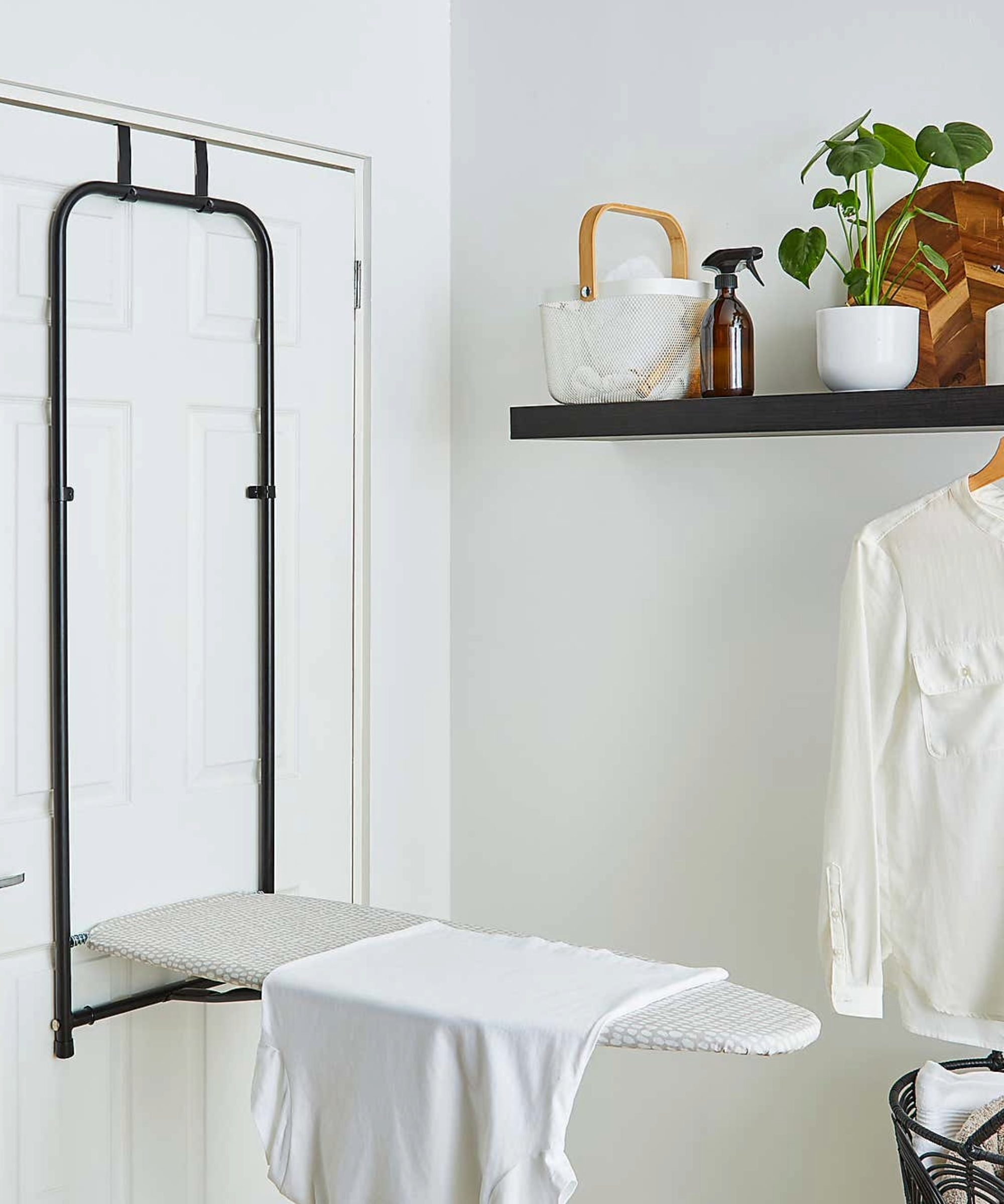Ironing board on the back of a door