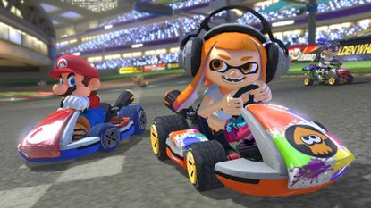 Mario Kart 8 Deluxe screenshot shows Mario and Inkling racing.