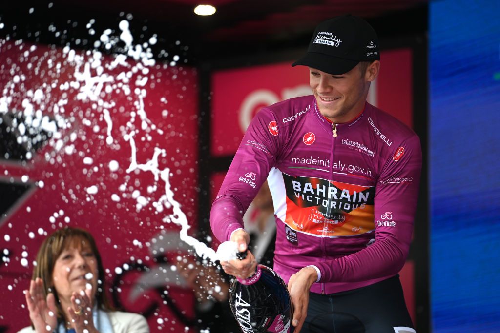 TORTONA ITALY MAY 17 Jonathan Milan of Italy and Team Bahrain Victorious celebrates at podium as Purple Points Jersey winner during the 106th Giro dItalia 2023 Stage 11 a 219km stage from Camaiore to Tortona UCIWT on May 17 2023 in Tortona Italy Photo by Tim de WaeleGetty Images