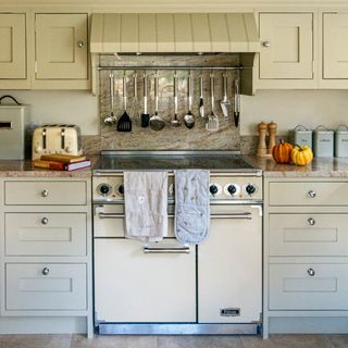 kitchen with cream coloured drawers and spatula