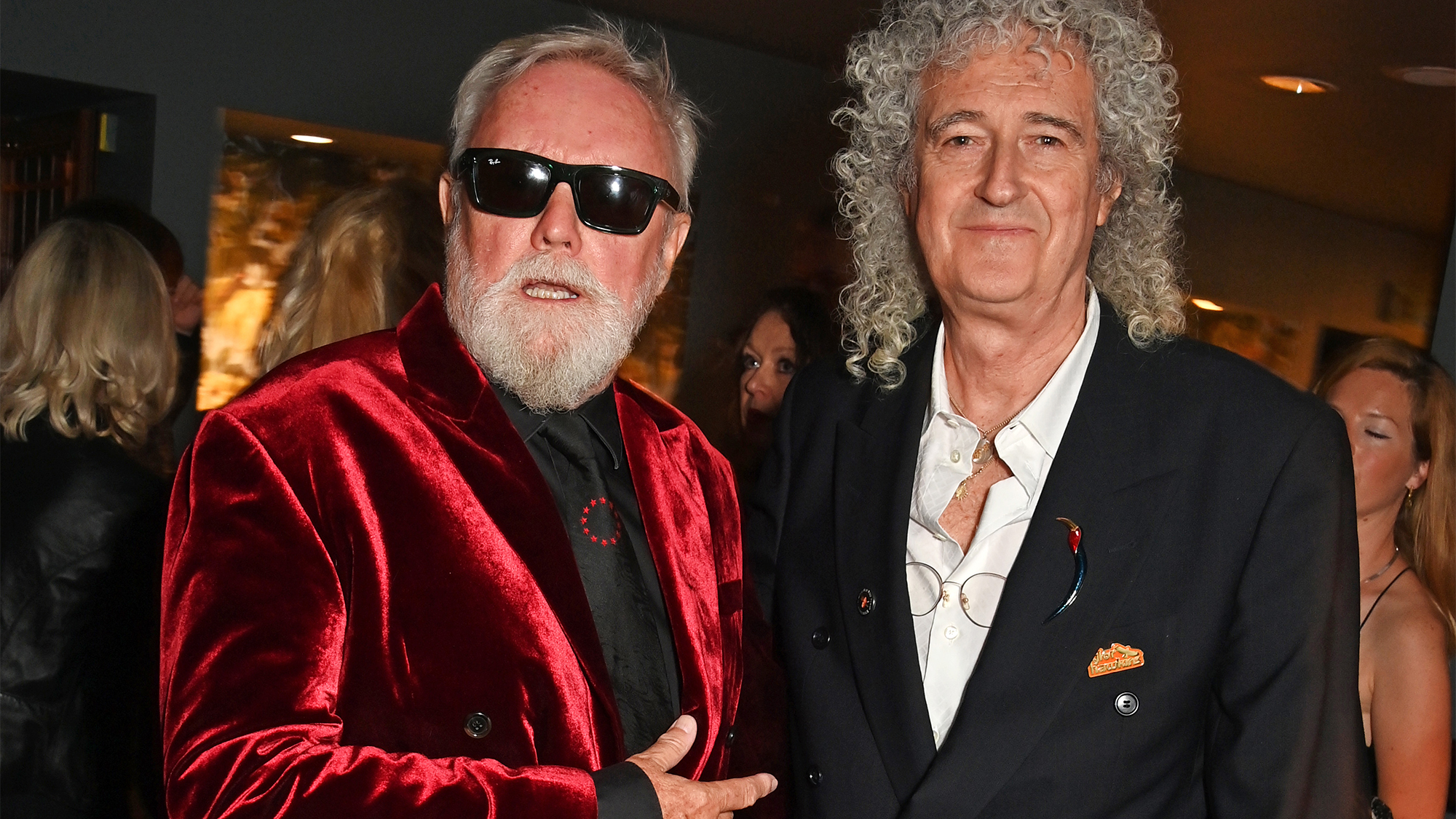 Roger Taylor, Brian May and guest attend the Gala Night performance of "We Will Rock You" at the London Coliseum on June 7, 2023 in London, England.