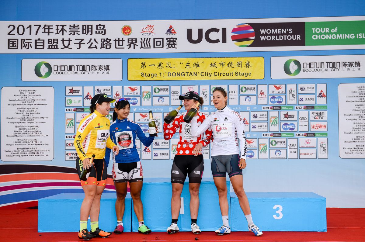 The classification leader's enjoy the time on the podium