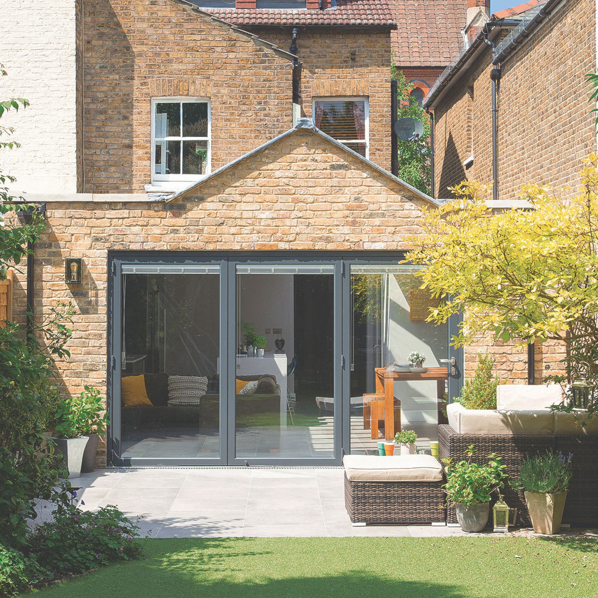Period property with a modern extension leading out into the garden, with large glass doors