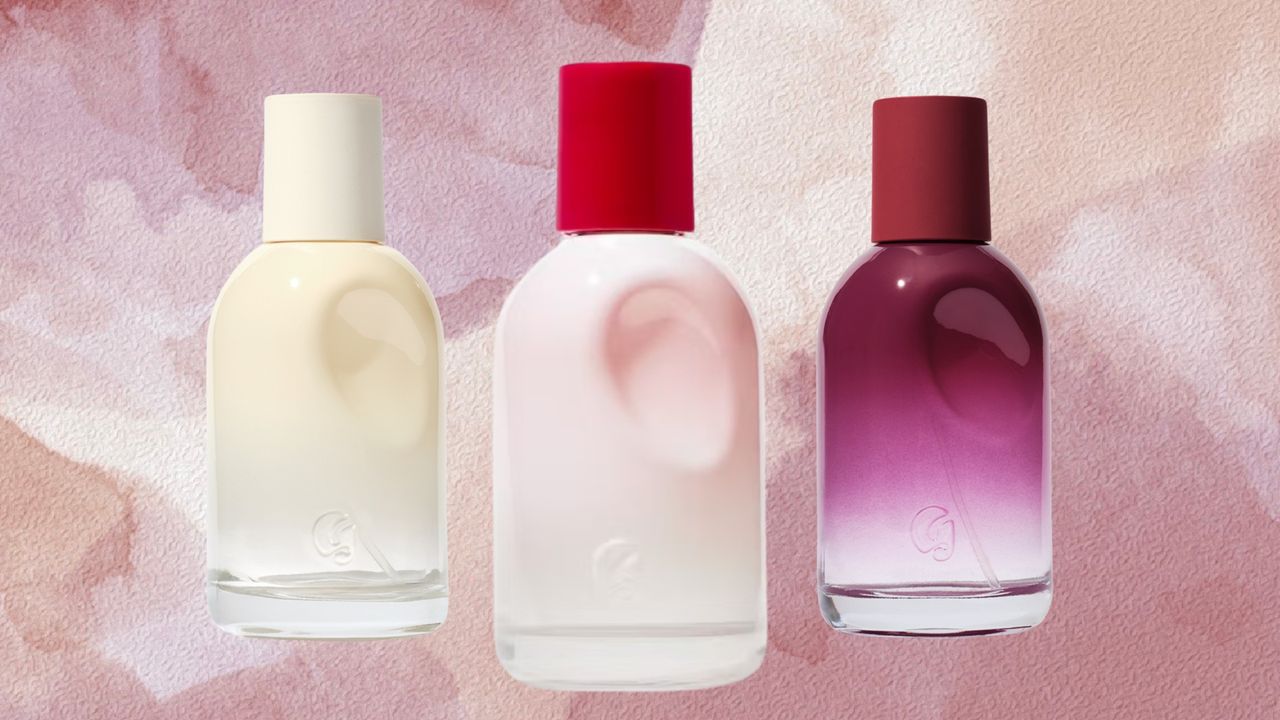 A close-up of all three Glossier You perfumes, including the original scent, Doux and Rêve/ in a pink and purple watercolour paint-style template