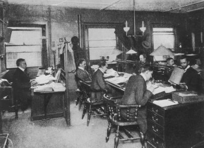 The editorial staff at Reuters Press Agency, circa 1900.