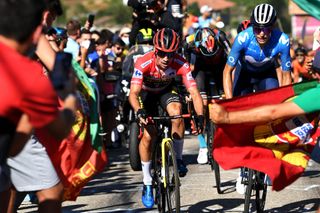 MOS SPAIN SEPTEMBER 04 LR Primoz Roglic of Slovenia and Team Jumbo Visma red leader jersey and Enric Mas Nicolau of Spain and Movistar Team attack in the breakaway during the 76th Tour of Spain 2021 Stage 20 a 2022km km stage from Sanxenxo to Mos Alto Castro de Herville 502m lavuelta LaVuelta21 on September 04 2021 in Mos Spain Photo by Tim de WaeleGetty Images