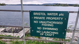 a sign warns against swimming in Chew Valley Lake