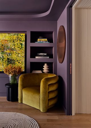 yellow chair in mauve room at New York townhouse