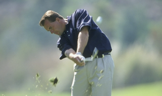 Ted Tryba plays an iron shot at the 1999 Nissan Open