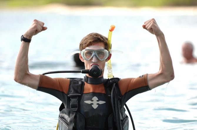 Andy Schleck practises his victory salutes
