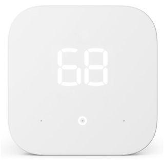 A white smart thermostat