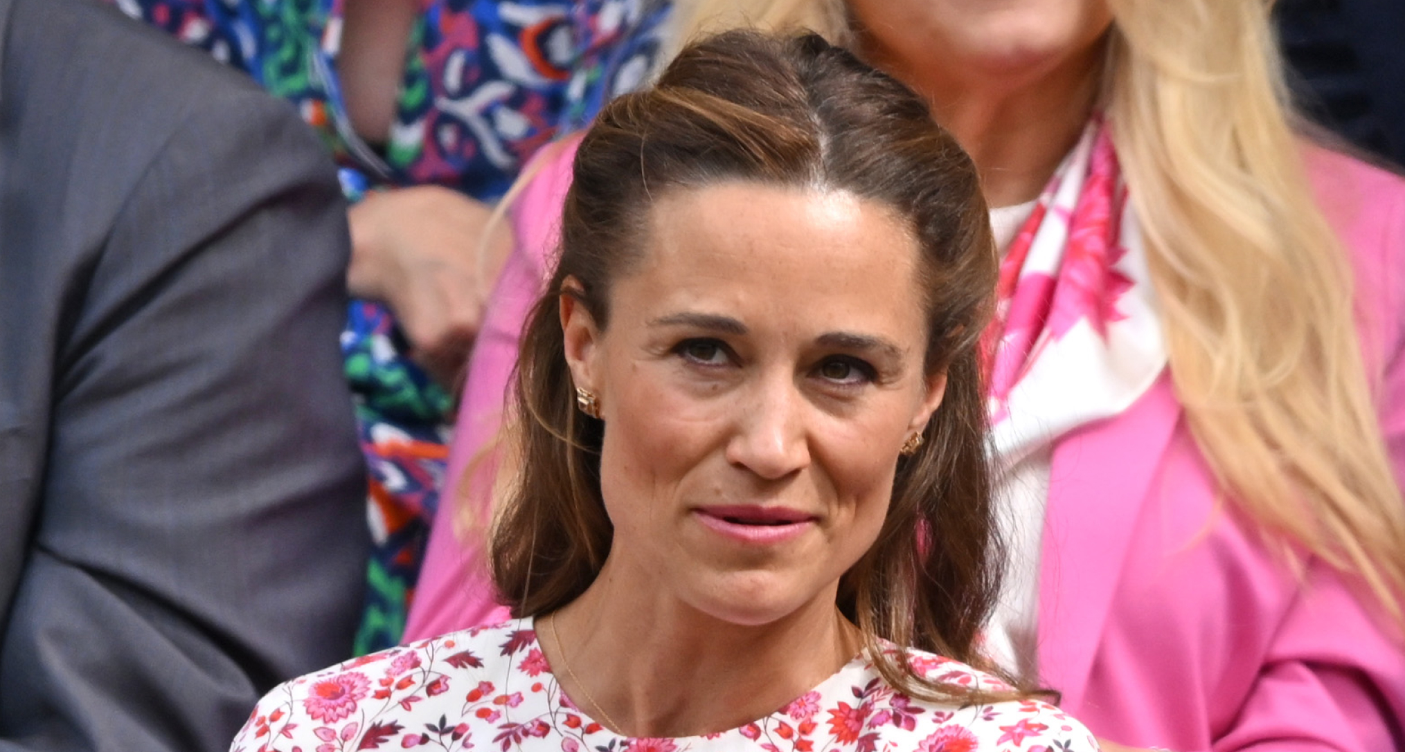 Pippa Middleton wearing a pink floral dress 