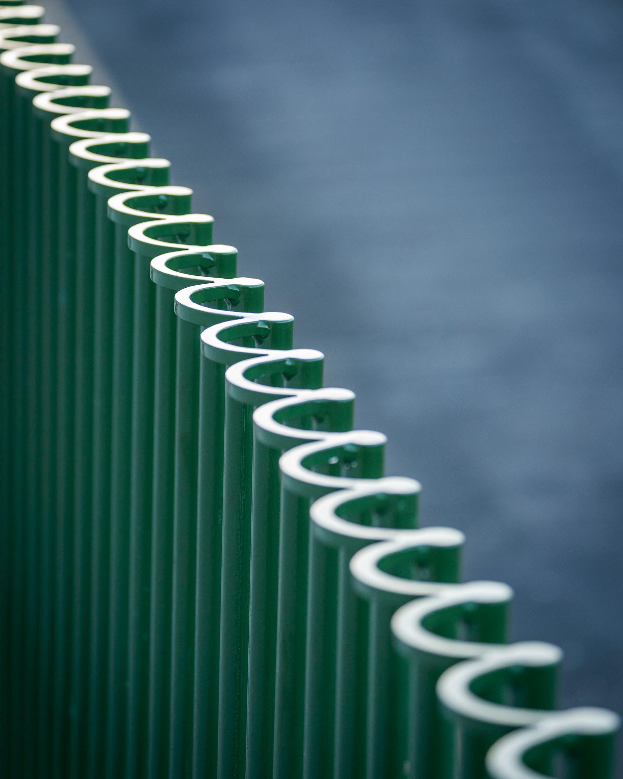 undulating green railing detail