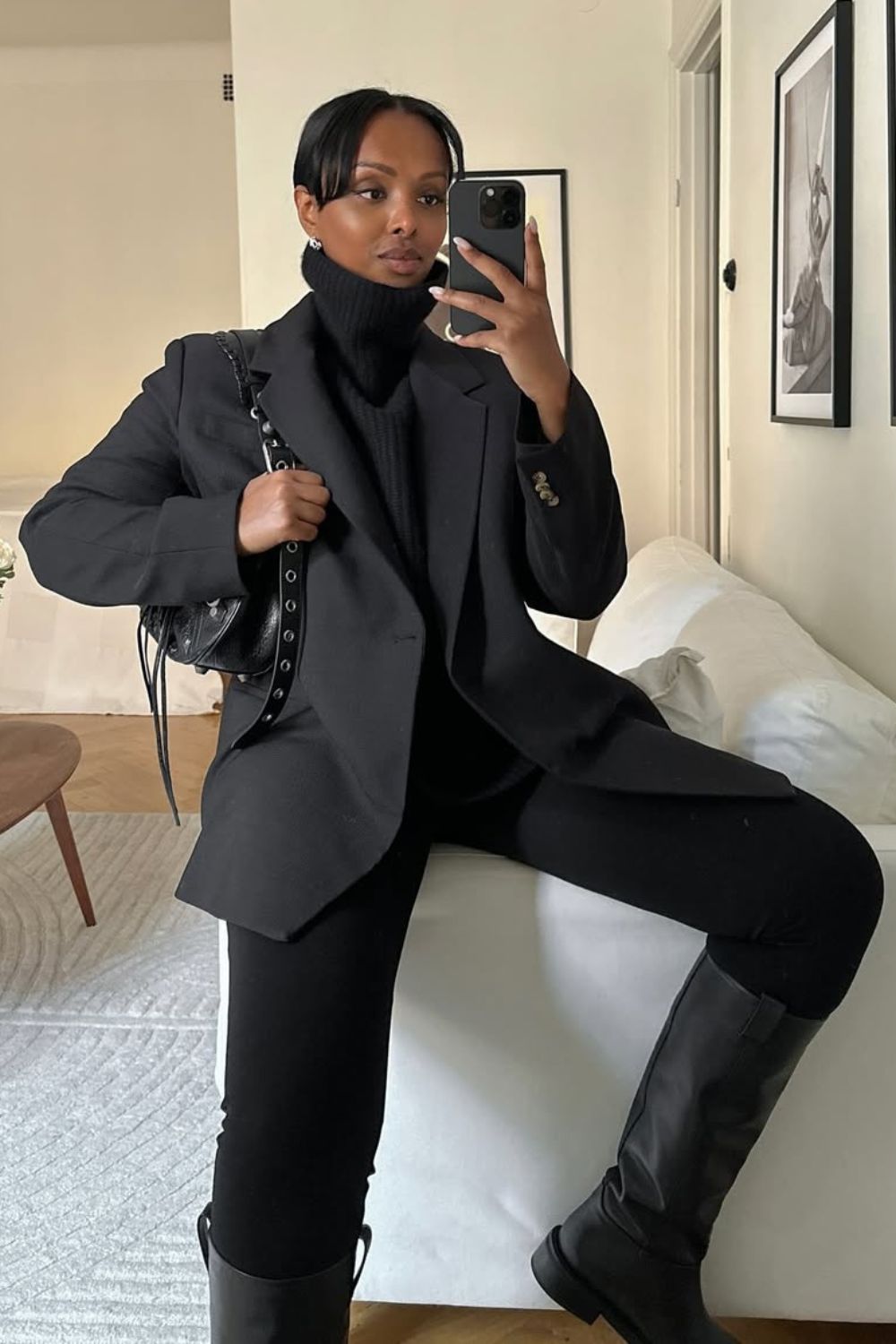 @femmeblk Black Boot Outfits wearing black blazer, jumper, leggings and knee-high riding boots