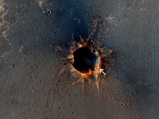 NASA's Mars rover Opportunity rests at the southeast rim of Santa Maria crater. NASA's Mars Reconnaissance Orbiter snapped this photo on March 1, 2011. 