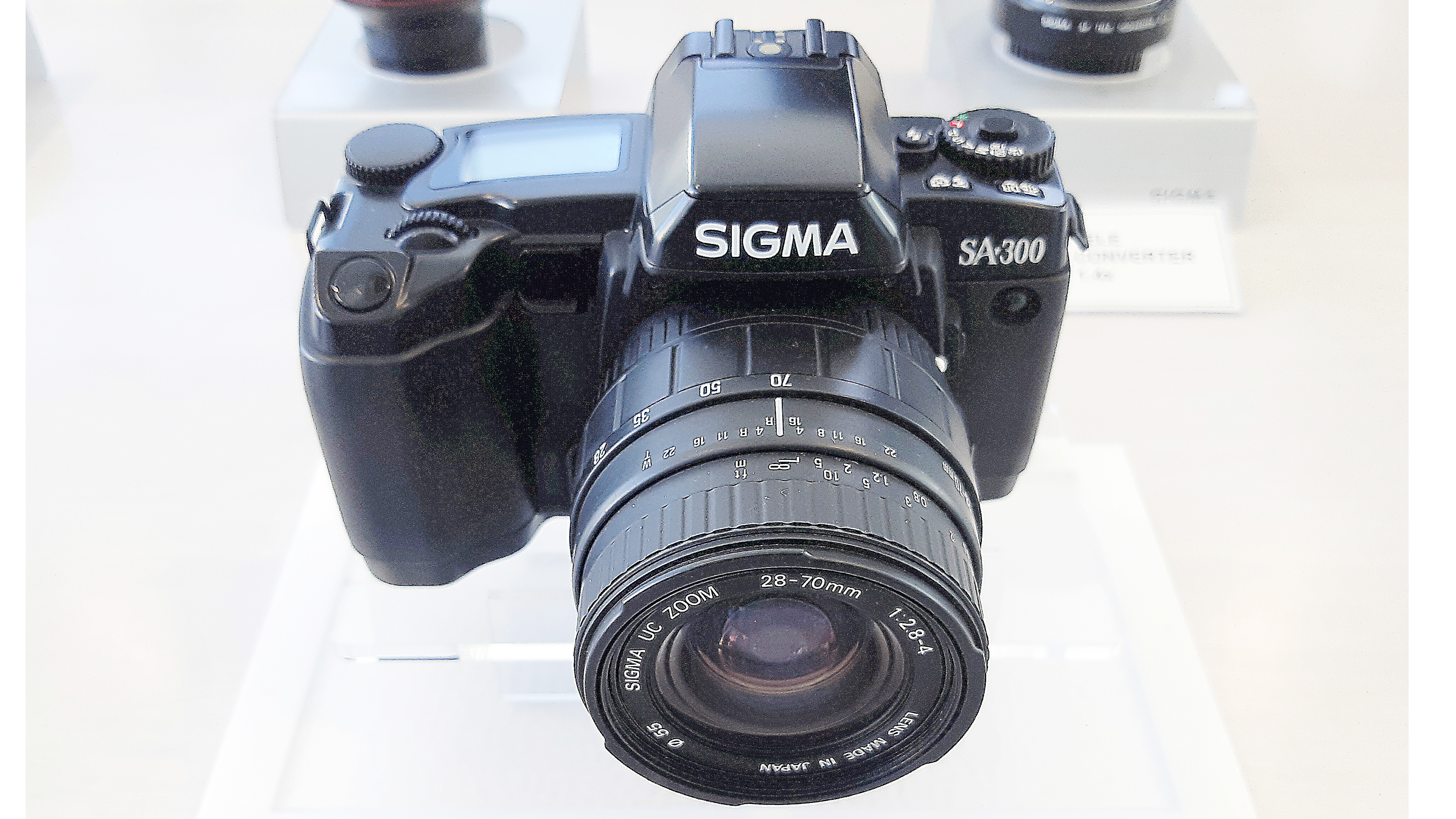 Sigma SA-300 (1992). First 35mm SLR with the in-house SA bayonet lens mount. Multi-mode with DX automatic film speed setting.