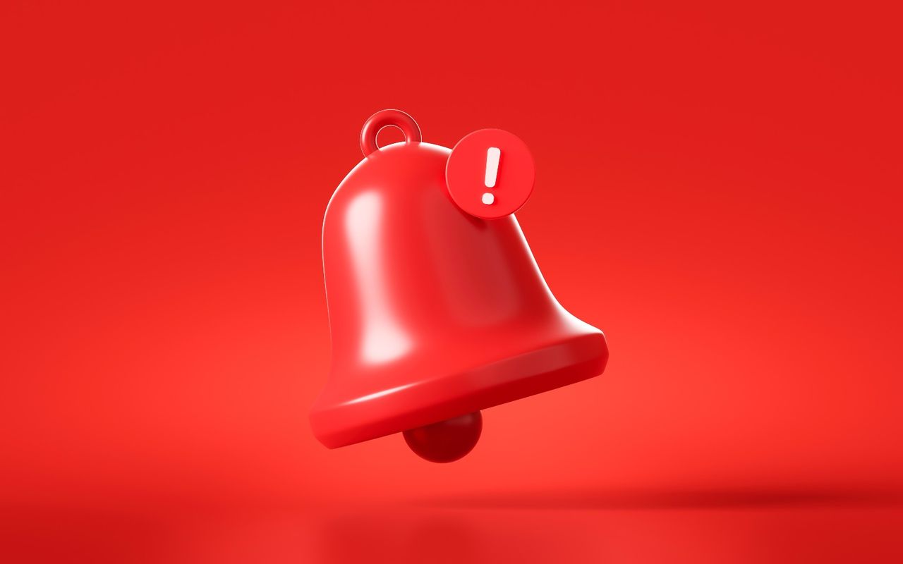 illustrated red bell with cell phone notification