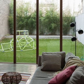 living room with sofaset and grass lawn
