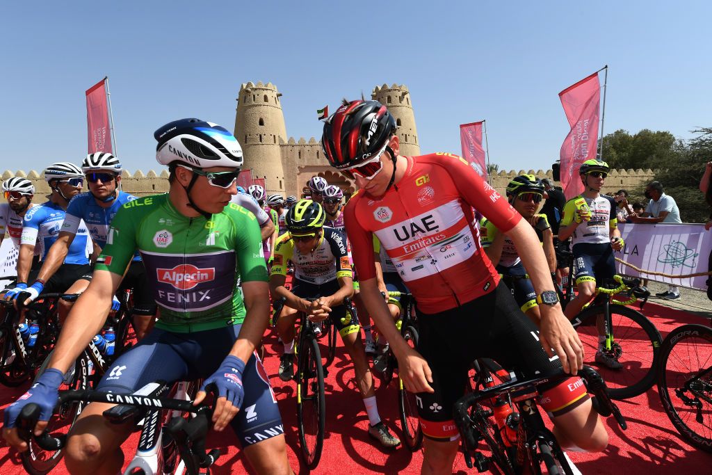 JEBEL HAFEET UNITED ARAB EMIRATES FEBRUARY 26 LR Jasper Philipsen of Belgium and Team AlpecinFenix Green Points Jersey and Tadej Pogacar of Slovenia and UAE Team Emirates Red Leader Jersey prior to the 4th UAE Tour 2022 Stage 7 a 148km stage from Al Jahili Fort to Jebel Hafeet 1025m UAETour WorldTour on February 26 2022 in Jebel Hafeet United Arab Emirates Photo by Tim de WaeleGetty Images