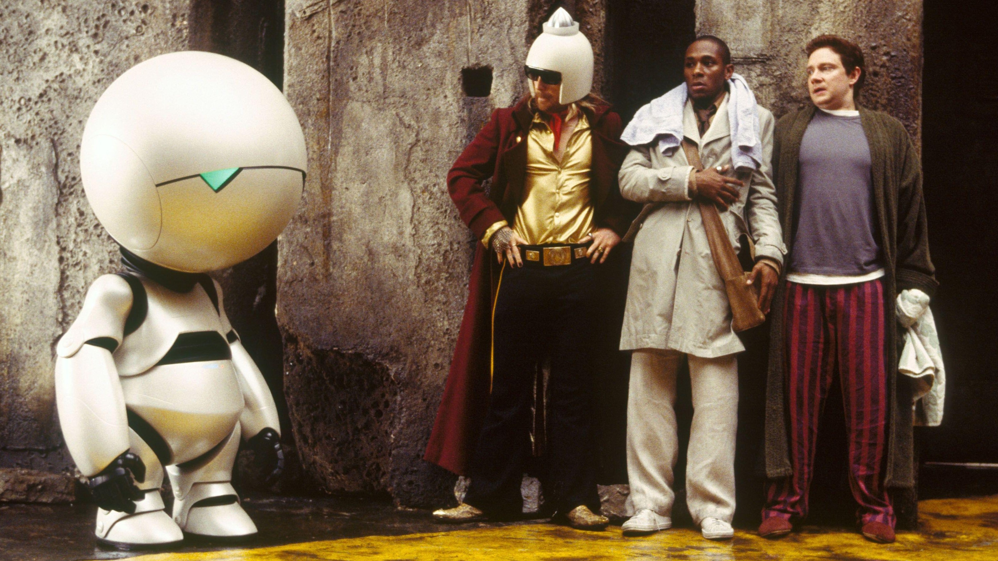 WARWICK DAVIS (ANDROID MARVIN), SAM ROCKWELL, MOS DEF, MARTIN FREEMAN in "The Hitchhiker's Guide to the Galaxy"