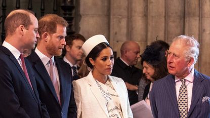 Meghan Markle talking to Prince Charles