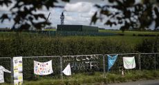 Anti-fracking banners hang on the fence surrounding Cuadrilla’s fracking site near Blackpool.