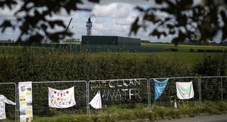 Anti-fracking banners hang on the fence surrounding Cuadrilla’s fracking site near Blackpool.