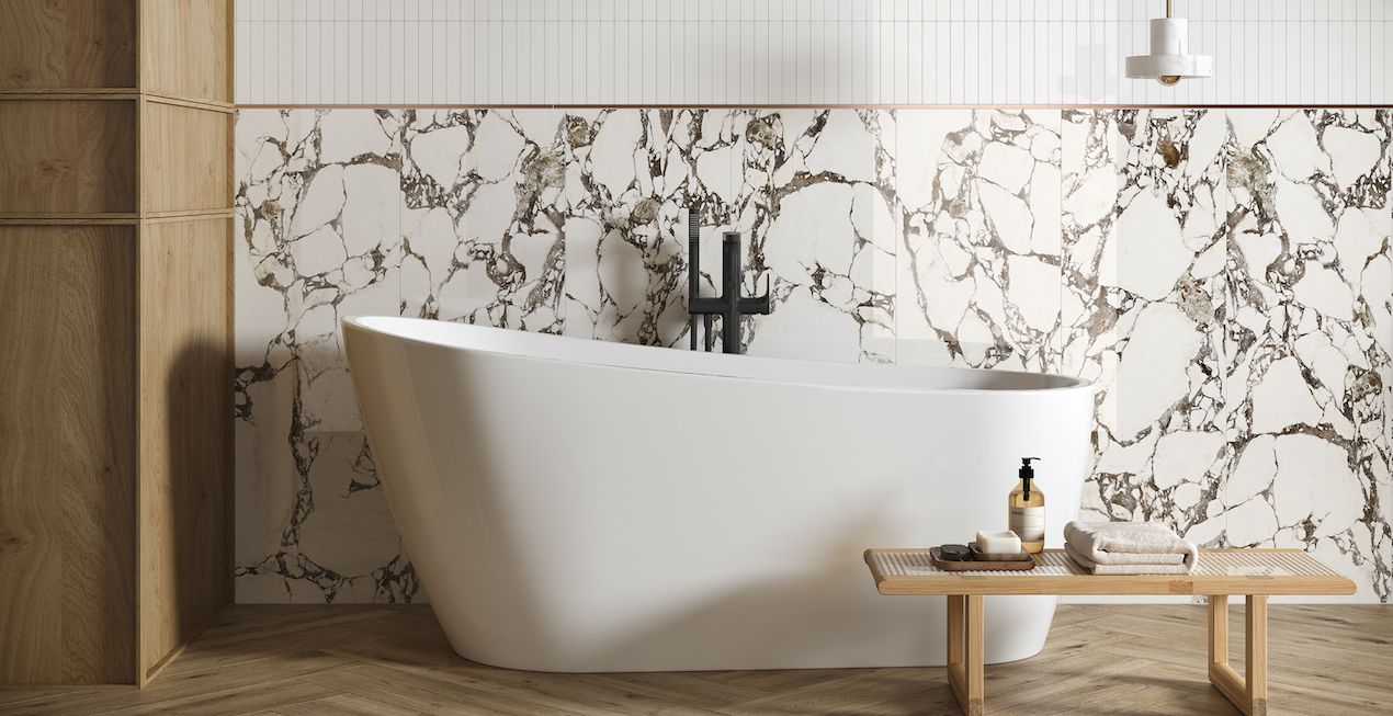 white bath with tiles behind