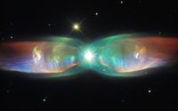 Over 4200 light-years away, this cosmic butterfly takes an odd two-lobed shape.