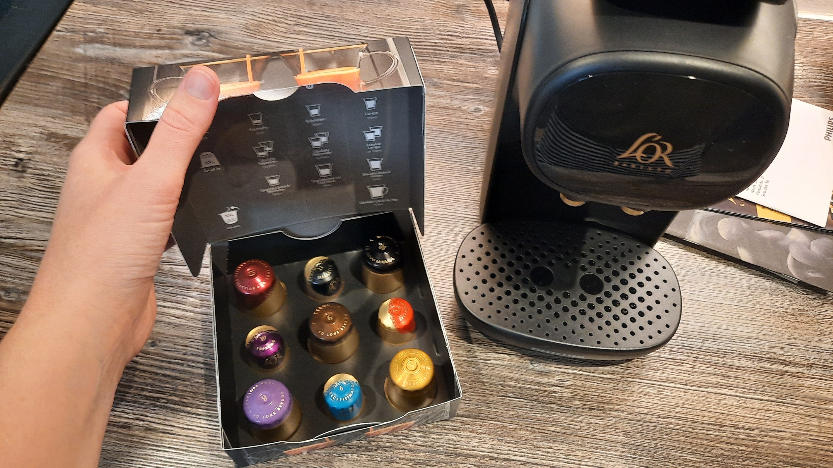 L'OR Barista Sublime coffee machine with sample capsules