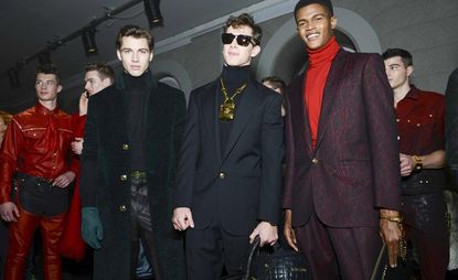 Male models wearing Versace