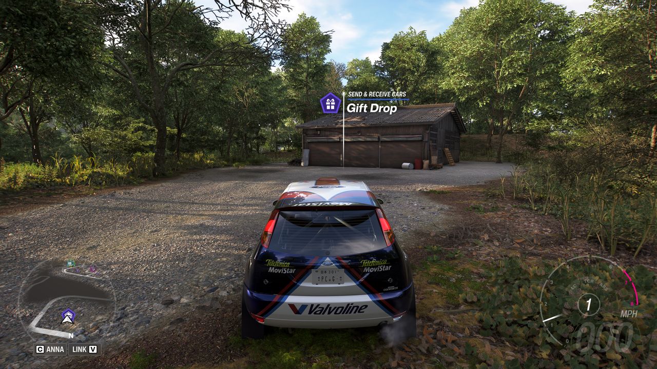 Forza Horizon 6 Barn Finds: A player parked outside an old wooden barn on a wooded hillside.