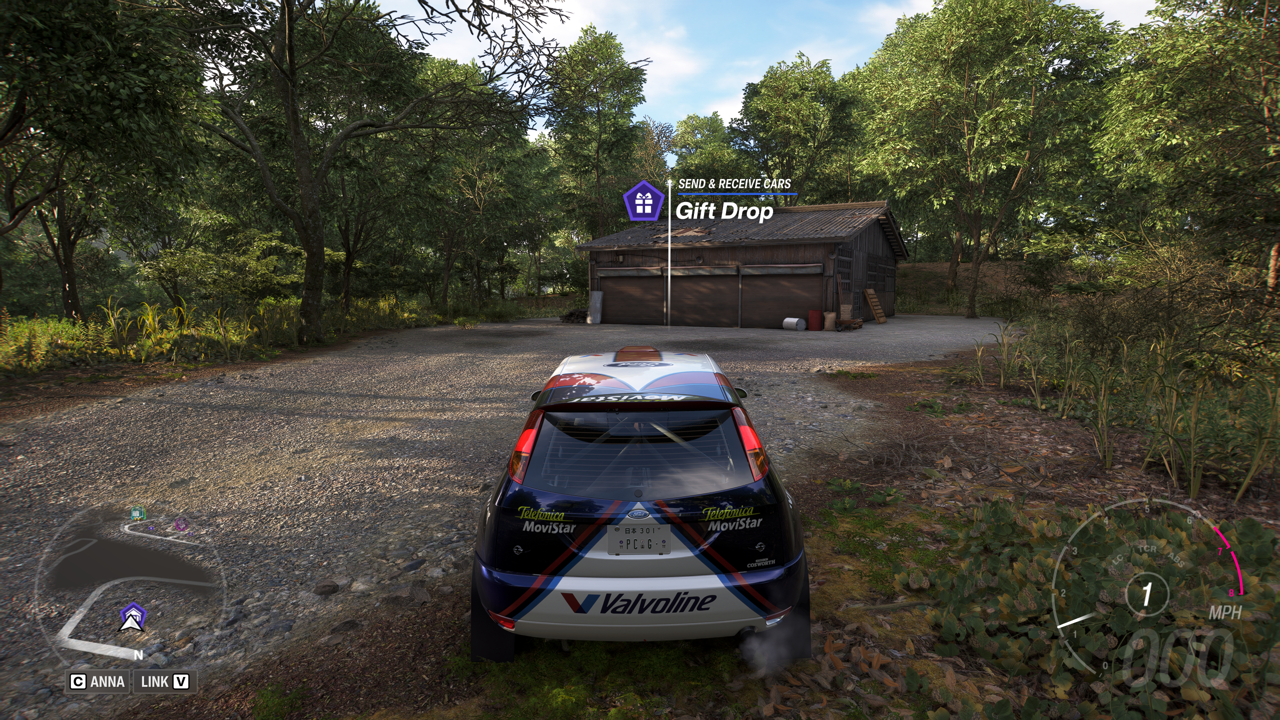 Forza Horizon 6 Barn Finds: A player parked outside an old wooden barn on a wooded hillside.