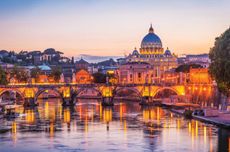 Rome&rsquo;s Ponte Sant&rsquo;Angelo Roman bridge with St Peter&rsquo;s Basilica, Vatican City, beyond