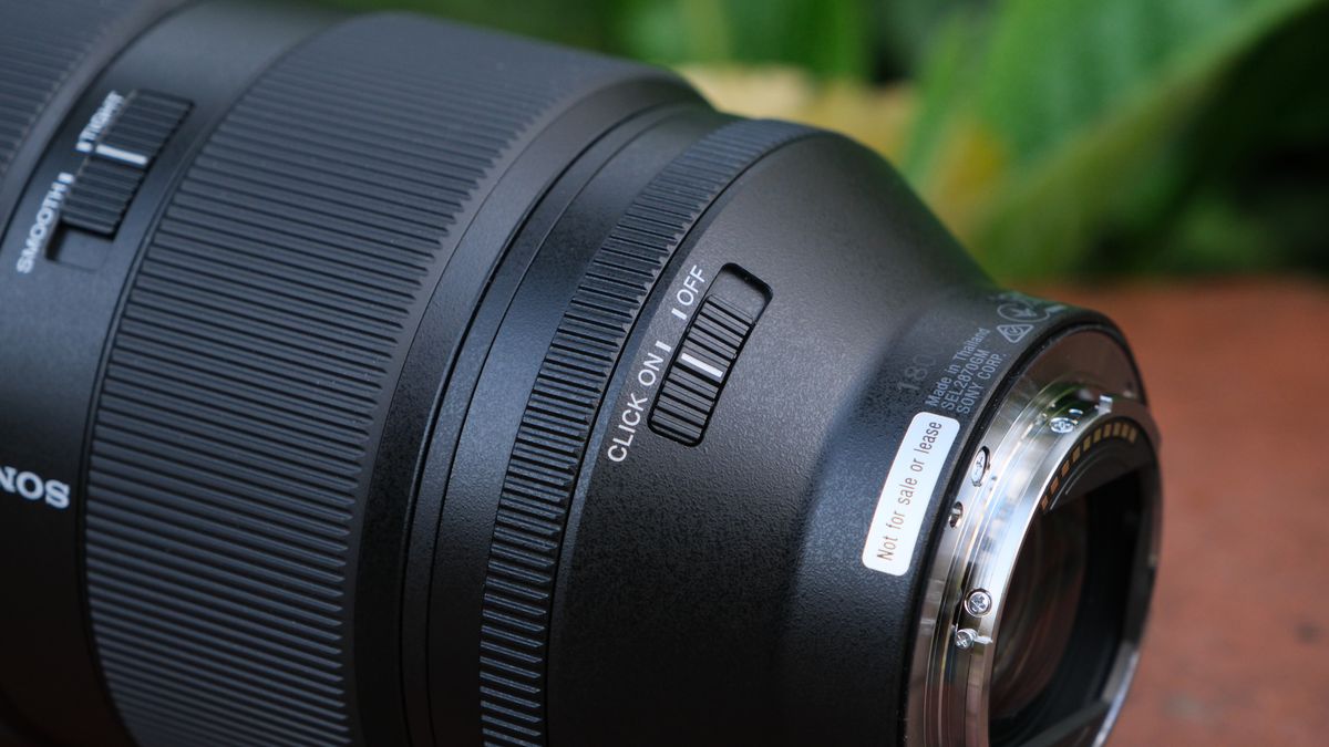Close-up of the click on off switch on a Sony FE 28-70mm f/2 GM lens