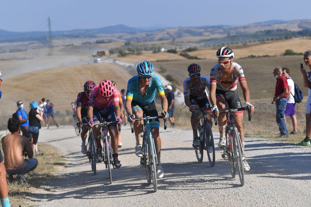 SIENA ITALY AUGUST 01 Alberto Bettiol of Italy and Team EF Pro Cycling Jakob Fuglsang of Denmark and Astana Pro Team Maximilian Schachmann of Germany and Team BoraHansgrohe Davide Formolo of Italy and UAE Team Emirates Gravel Strokes Dust during the Eroica 14th Strade Bianche 2020 Men a 184km race from Siena to SienaPiazza del Campo StradeBianche on August 01 2020 in Siena Italy Photo by Tim de WaeleGetty Images