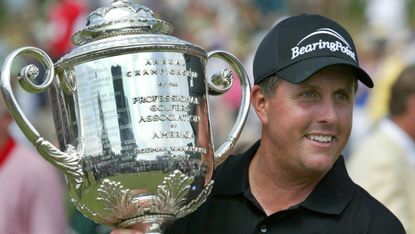 Phil Mickelson with the trophy after his win in the 2005 PGA Championship at Baltusrol Golf Club 