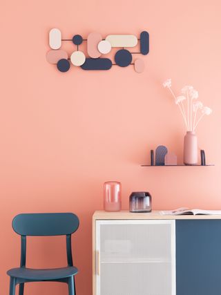 Maisons du monde blue chair against pink wall