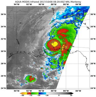 On Oct. 8, 2017, the MODIS instrument aboard NASA's Aqua satellite analyzed Tropical Storm Nate's cloud top temperatures in infrared light. The strongest areas (in yellow) are seen at the storm's center.